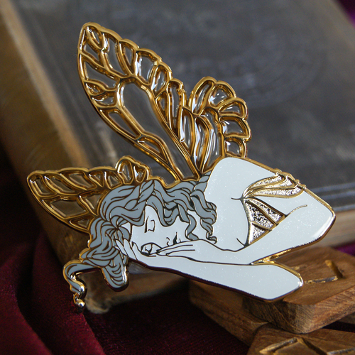 Enamel pin depicting Titania, queen of the fairies. Her wings are clear glass. The background is an old tome, and wooden runes.